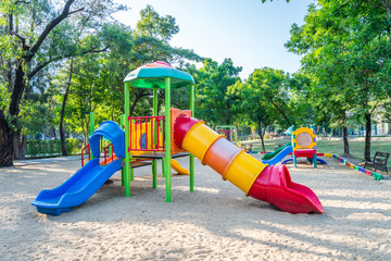 Outdoor children playground in green nature city park