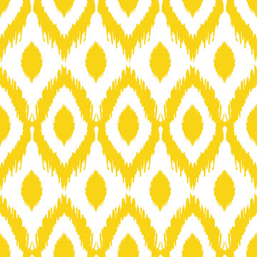 Seamless ikat pattern in yellow and grey colors. Vector tribal background