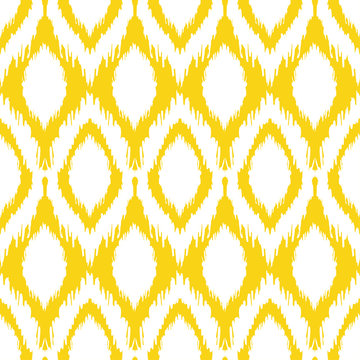 Seamless ikat pattern in yellow and grey colors. Vector tribal background
