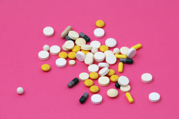 Medicines different forms and colors at bright background
