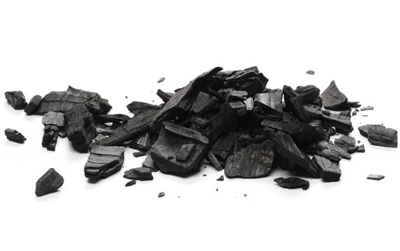 Charcoal pile isolated on white background