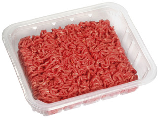 Minced meat in a plastic tray isolated on white background
