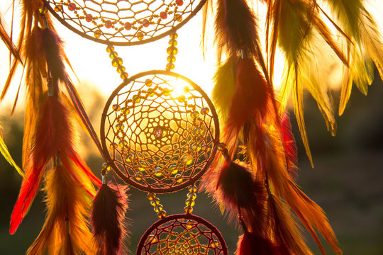 Handmade dream catcher with feathers threads and beads rope hanging