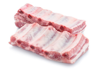 Raw ribs on white background