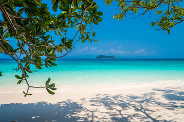 Fototapeta na wymiar Beautiful tropical island white sand beach blue sky sunny day - Summer breeze travel holiday