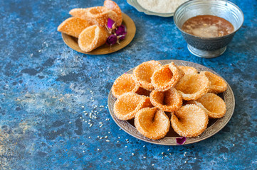 Honey and sesame babouches - popular arabic dessert. Arabic and middle eastern food concept