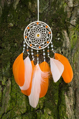 Handmade dream catcher with feathers threads and beads rope hanging