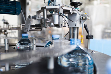 Bottling plant - Water bottling line for processing and bottling pure mineral carbonated water into bottles and gallons.