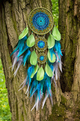 Handmade dream catcher with feathers threads and beads rope hanging