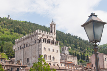 Ducal palace seen from below and typical street lamp