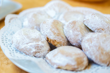 Fototapeta na wymiar Sicilian sweets. Close-up of traditional sicilian sweets (cassatelle) on a plate