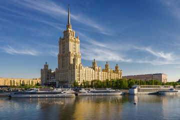 Sunny view of Smolenskaya embankment and Moskva river, Moscow, Russia.