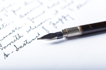 Fototapeta premium Fountain pen on an antique handwritten letter
