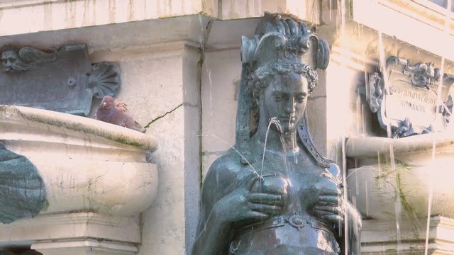 lactating nymph in ancient fountain