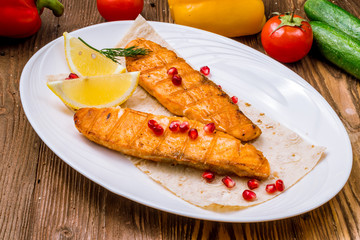 Salmon steak on the grill