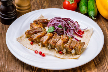 Kebab from lamb ribs