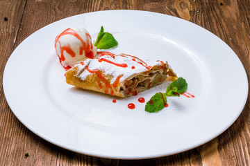 Apple strudel with ice cream