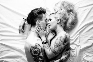 Close up portrait of a sexy young couple kissing.