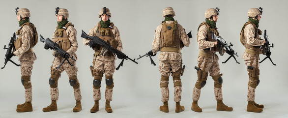 Soldier in camouflage holding rifle