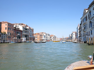 Fototapeta na wymiar 20.06.2017, Venice, Italy: View of historic buildings and canals from gondola