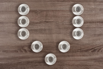 Top view of letter V made of coffee cups