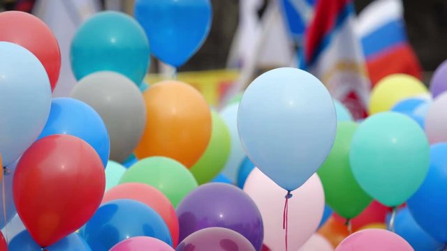 Festive color helium balloons.  
