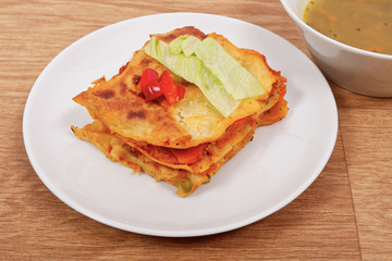 Lasagna with vegetables on a table