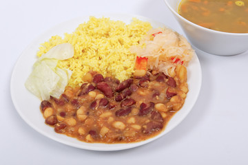 Red beans with curry rice on a white
