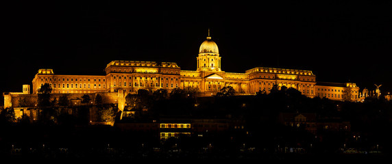 Naklejka na ściany i meble Budapest at night: Royal Palace of Buda with lights, fromt view