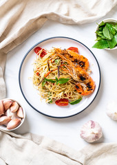 stir-fried spaghetti with grilled shrimps and tomatoes