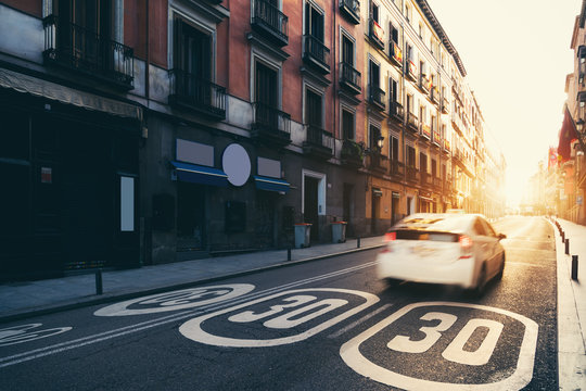 Madrid City center, old street and buildings  during sunrise in Madrid, Spain