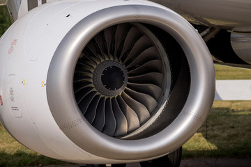 Turbine large passenger aircraft close up at the airport