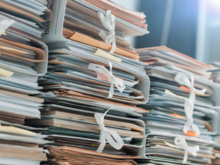 Stacks of paperwork in the office