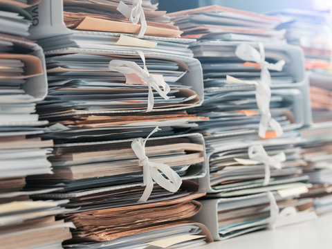 Stacks of paperwork in the office