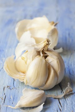 A bowl of garlic, broken open