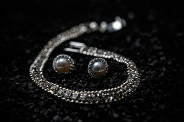 Women necklace, bracelet and earrings