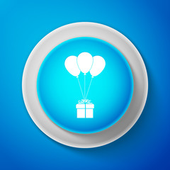 White Gift box with balloons icon isolated on blue background. Circle blue button with white line. Vector Illustration