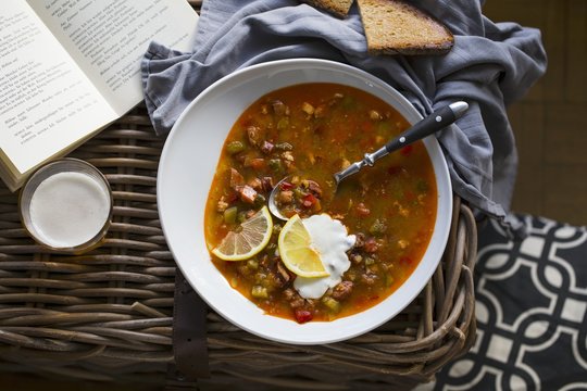 Solyanka soup with sour cream and lemon