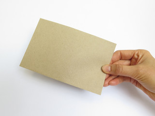 Envelope holding by woman's hand with white background