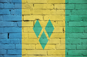 Saint Vincent and the Grenadines flag is painted onto an old bri