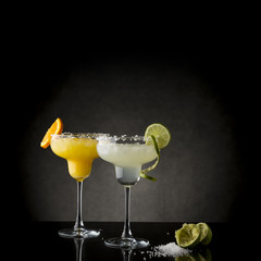 Lime and orange margarita cocktails