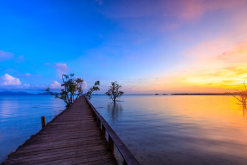 Colorful sunset on the bridge of dream  at  Koh  Mak island, Trat province, Thailand.