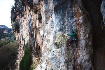 A rock climber on a rock.