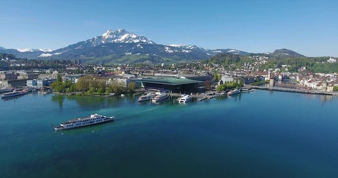 Aerial of Lake Lucerne with Mount Pilatus in the background and a ship leaving