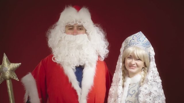 Santa Claus and Snow Maiden congratulates everyone on Christmas and New Year