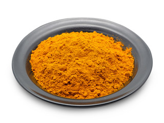 Turmeric powder in bowl.