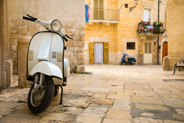 View of a narrow sunny street in the city Bari, Italia