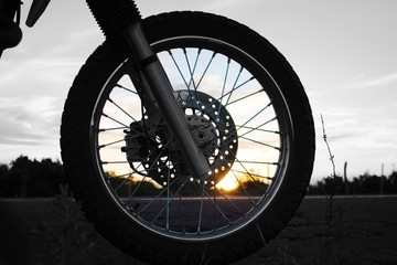 Naklejka premium Motorcycle in sunset
