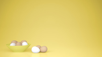 Chicken eggs into a yellow cup and on the table, yellow background with copy space, breakfast easter food concept idea