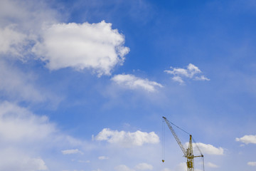 Obraz premium construction crane on blue sky
